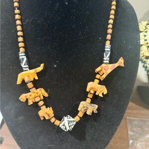 Hand carved Wooden Elephant Necklace in Warm Orange Tones